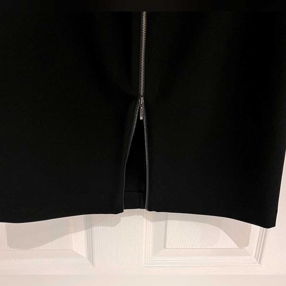 Skirt side zipper 
black pencil style 
stretchy fabric 
size 12
Brand new
